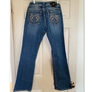 Miss Me boot cut jeans with design on back pockets